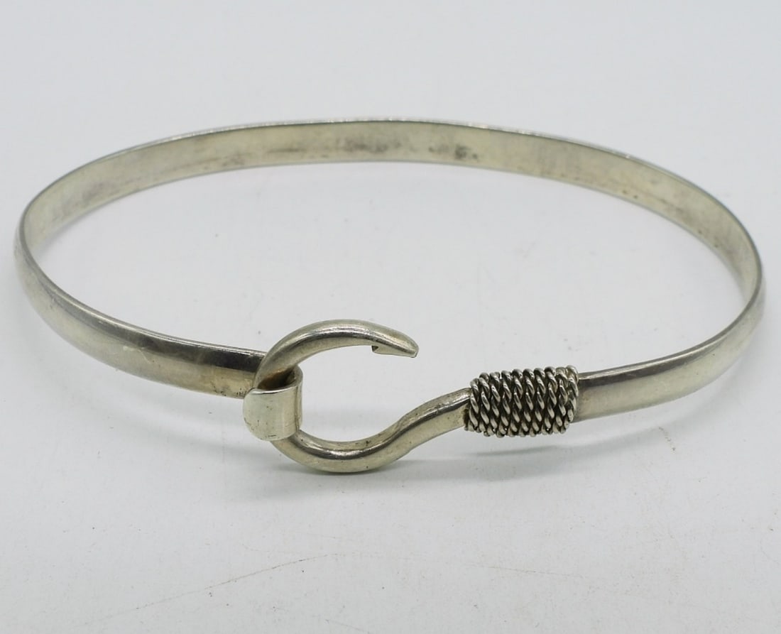Sterling Fishhook Bangle Bracelet: Sterling fishhook bangle bracelet, 8" around. (11.7 dwt) (6x4x2)