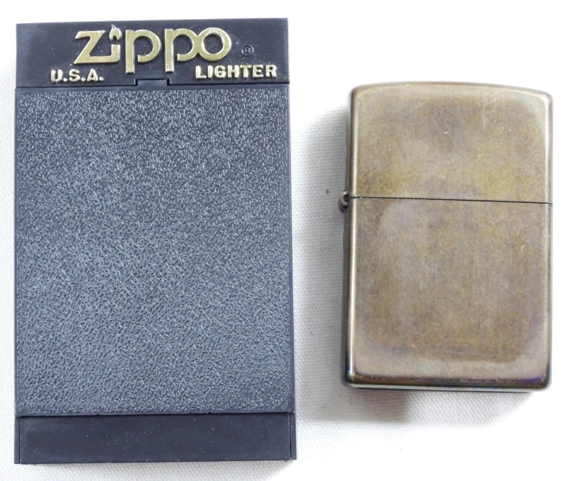 2001 Copper Colored Zippo, Unsealed: Comes in a Zippo box, unsealed, unfired