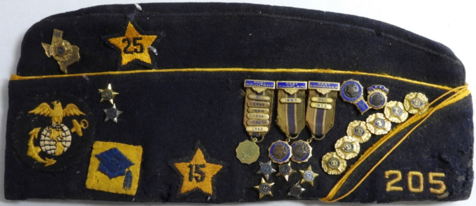 American Legion Wool Cap: Very old and has holes. Harlingen, Tex 205. With 4 patches and 19 pins from 1948 to 1964