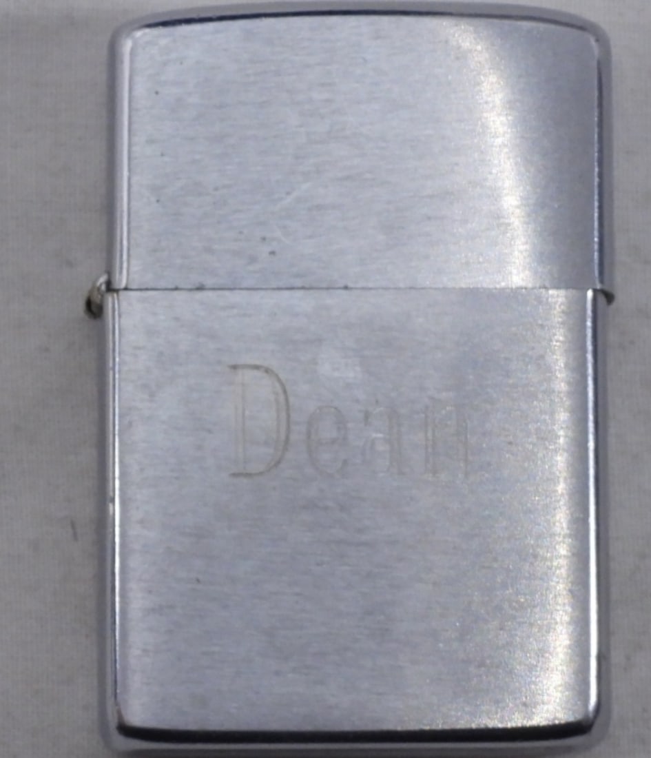 Silver Zippo, Not Sealed: Does not come in box, Fired, Not sealed, Engraved Name on front
