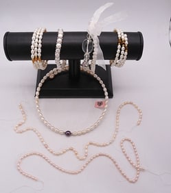 (7) Beaded Bracelets & A Necklace