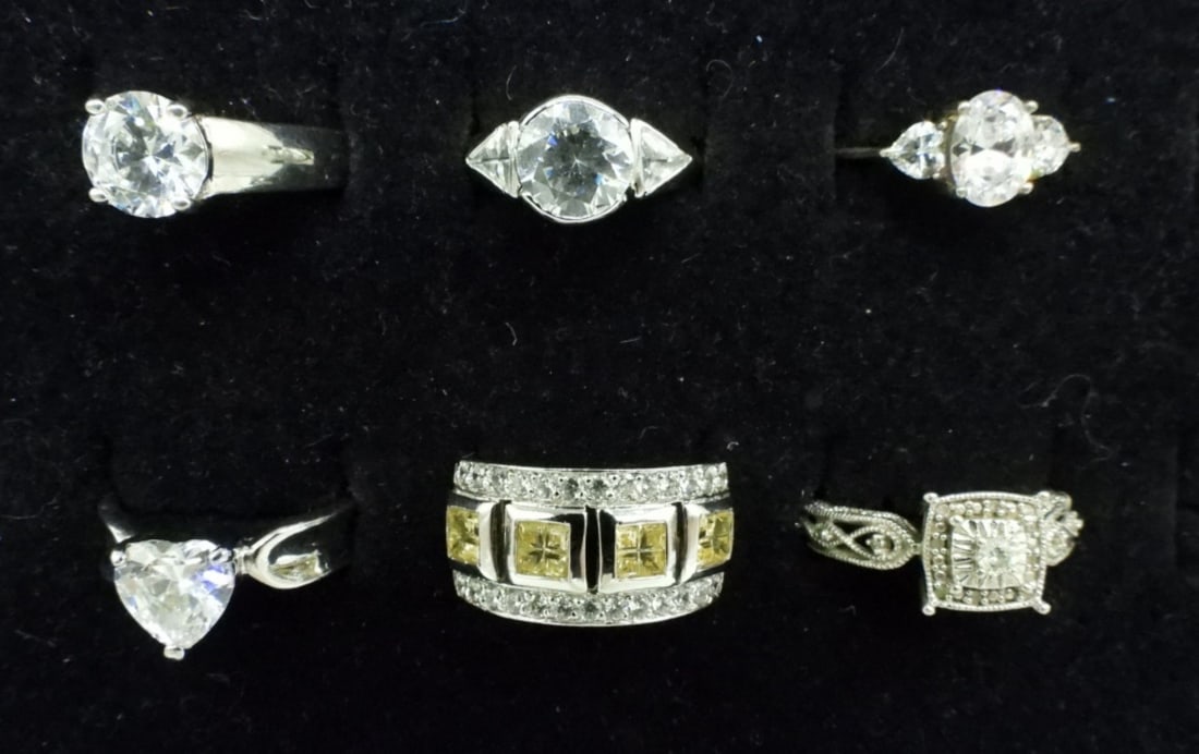 6 Sterling Bridal Style Rings: Six sterling bridal style rings. Sizes 4.5-7 (16.4 dwt)