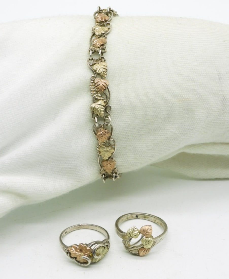 Sterling & 12k Leafy Bracelet & Rings: These are Black Hills Gold style pieces. Sterling and some 12k gold overlay. Bracelet is 7" long. Two sterling rings, size 6. (8.5 dwt) (6x4x2)