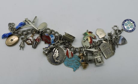 1960's Sterling Charm Bracelet with 23 Charms