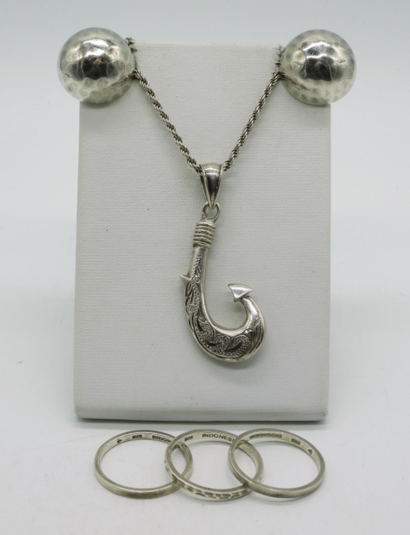 Sterling Fish Hook, Rings & Earrings: Sterling fish hook pendant (2") on a 24" sterling chain. One pair clip on sterling earrings. Three sterling bands, all size 9. (18.5 dwt) (6x4x2)