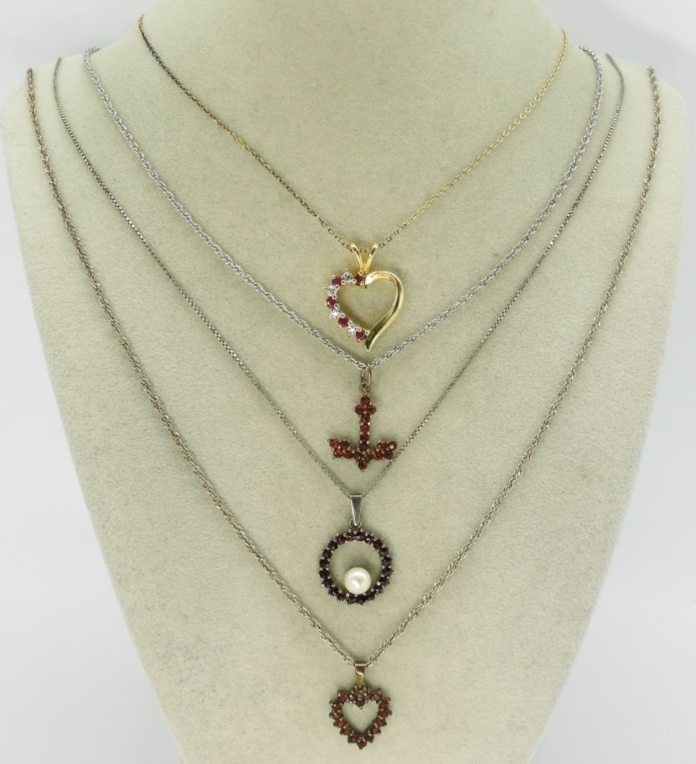 4 Sterling Necklaces with Garnet Gemstones: Four sterling necklaces, 18-24" chains. Garnet, Pearl & Simulated Diamond gemstones. (10 dwt) (6x4x2)