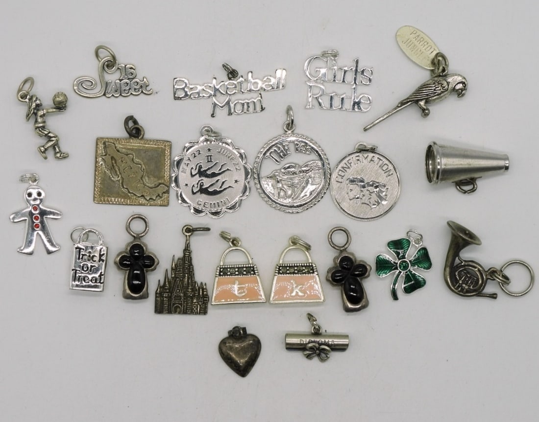 21 Sterling Charms: 21 Sterling Charms for bracelets, Disney, Religious, Holiday, Sports and more. (31 dwt) 6x4x2