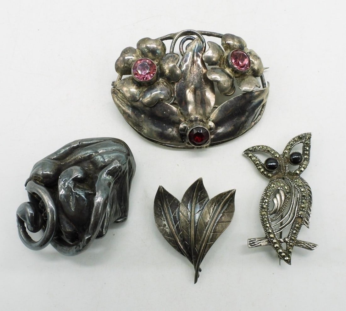 Four Sterling Brooches: Four vintage sterling brooches, 1.5" - 2.5". (27 dwt)