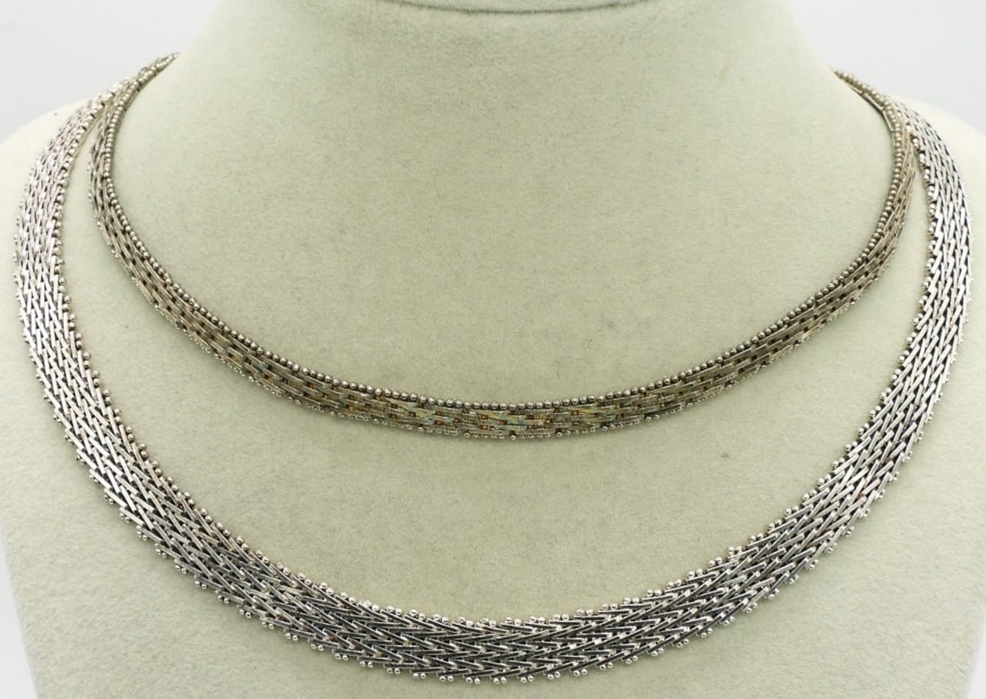 Two Sterling Weave Chain Necklaces: Two sterling weave necklaces. 17" & 18". (43.8 dwt)