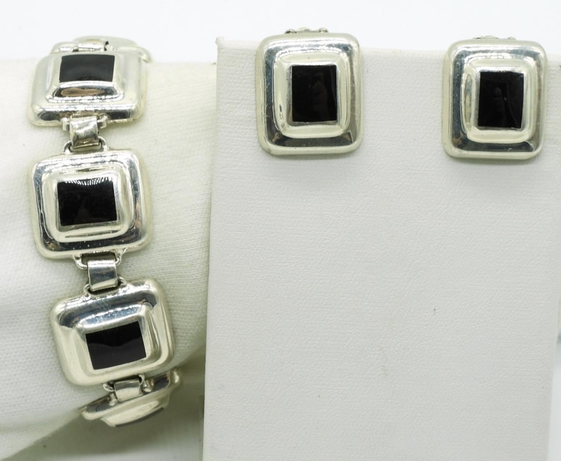 Taxco Sterling Black Onyx Matching Set: Taxco "TJ-70 Mexico 925" sterling with black onyx. Matching bracelet and clip on earrings. (32 dwt) (6x4x2)