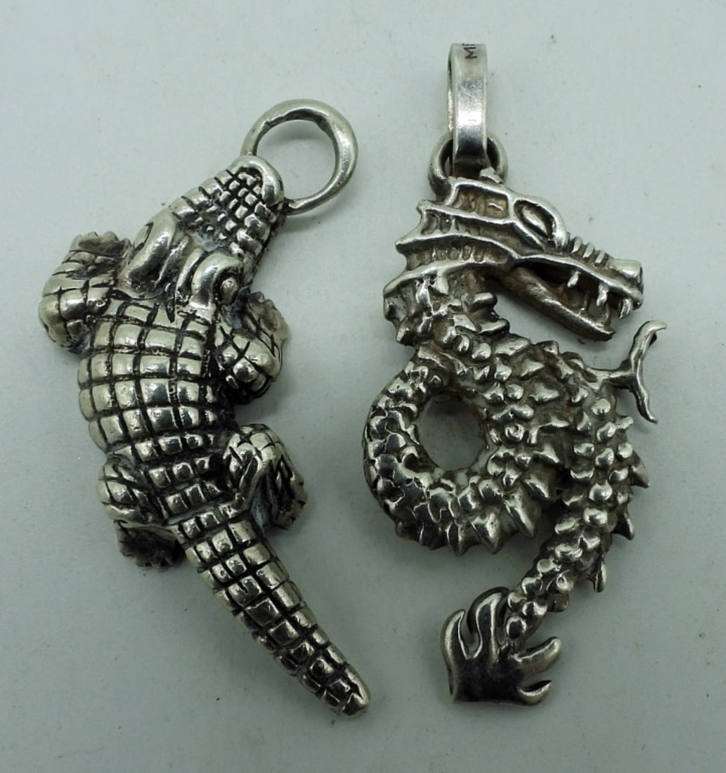 2 Sterling Pendants, Dragon & Alligator: Two sterling pendants. Dragon is 2" long, Alligator is 2" long. (17.8 dwt) (6x4x2)