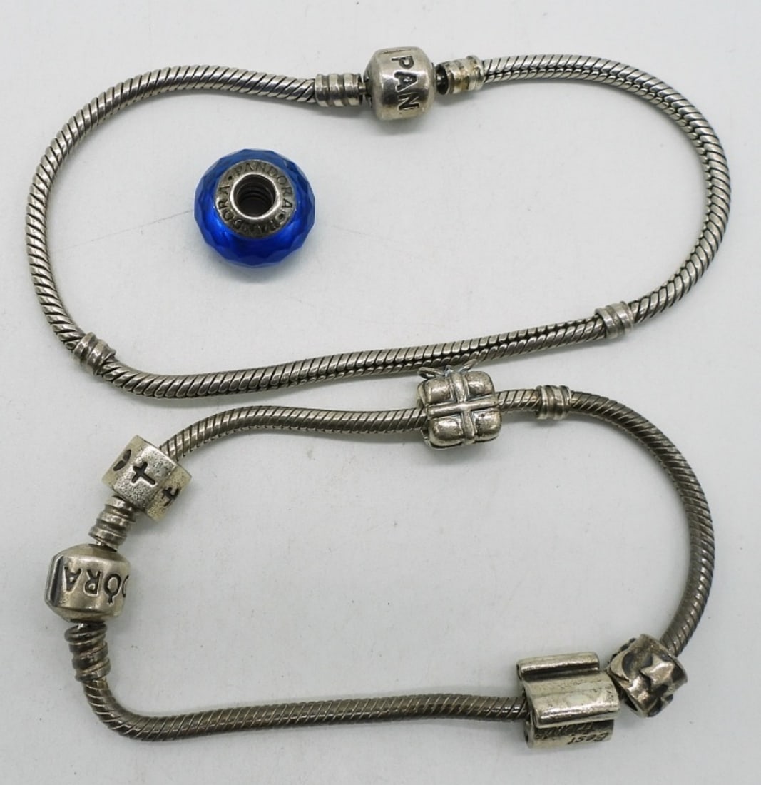 Two 925 Pandora Charm Bracelets - 5 Beads: Two sterling pandora charm bracelets with 5 beads. (28 dwt)
