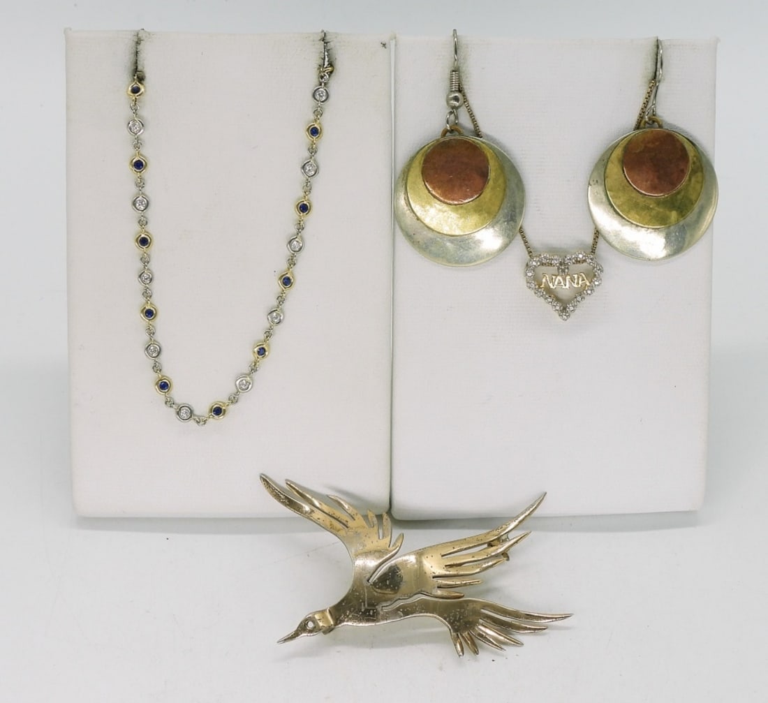 Gold Tone 925 Necklaces, Pin, Earrings: Two sterling necklaces, gold tone, 18". Bird brooch "Handmade Sterling", 2.5" long. Pierced tri tone earrings. (16.4 dwt)
