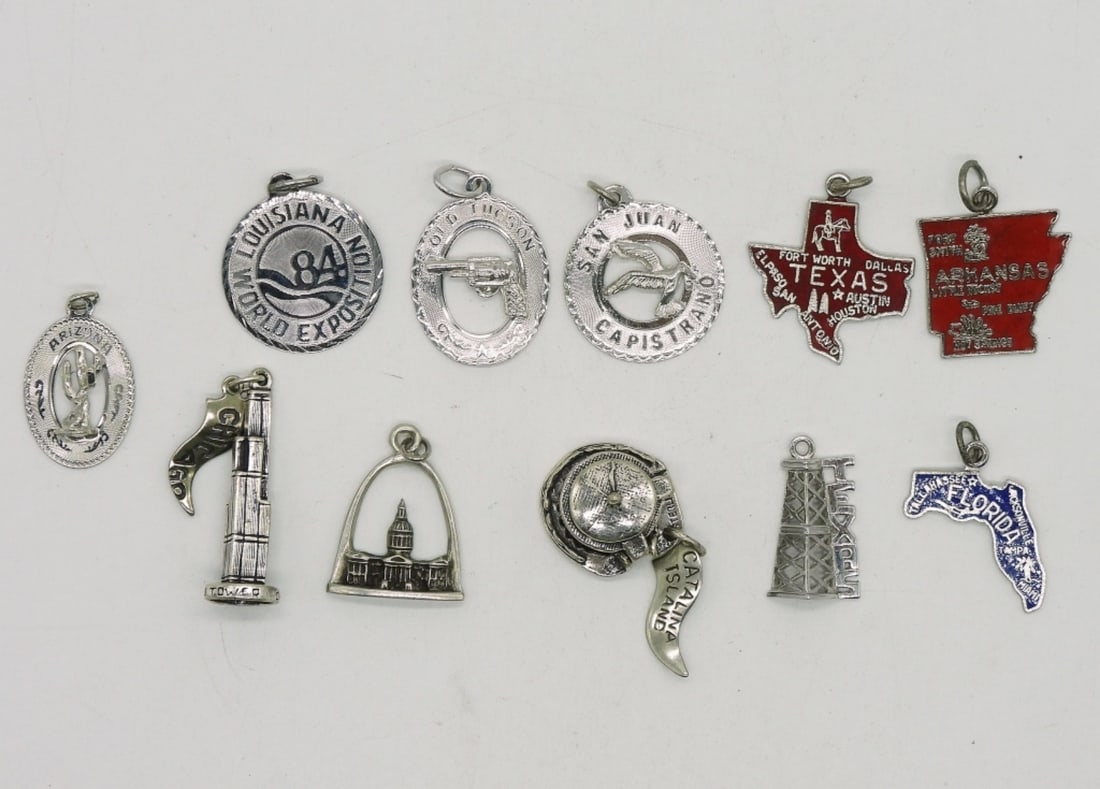 11 Vintage Sterling Charms: Eleven vintage sterling charms. Florida, Texas, Arkansas, Chicago, Louisiana, Catalina Island and more. (14.9 dwt)