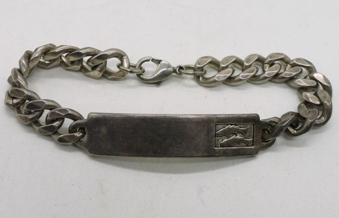 Unengraved 925 ID Bracelet: Vintage sterling ID bracelet, not engraved. With two fish on it. 8". (22.6 dwt)
