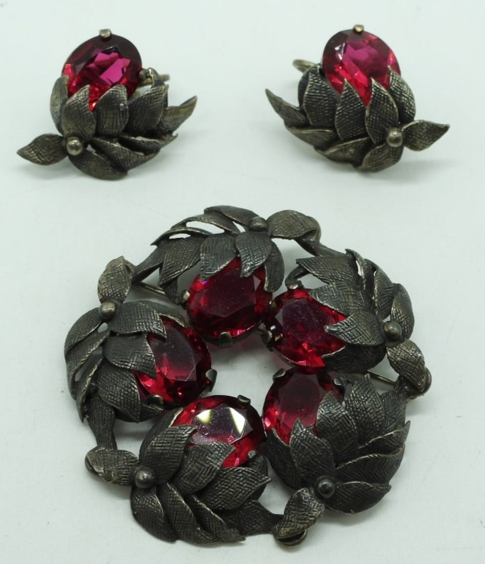 Red Rhinestone Cini Brand, Sterling Set: Gorgeous red rhinestone, sterling brooch, 2". With matching sterling clip on earrings, 1". (19 dwt) (6x4x2)