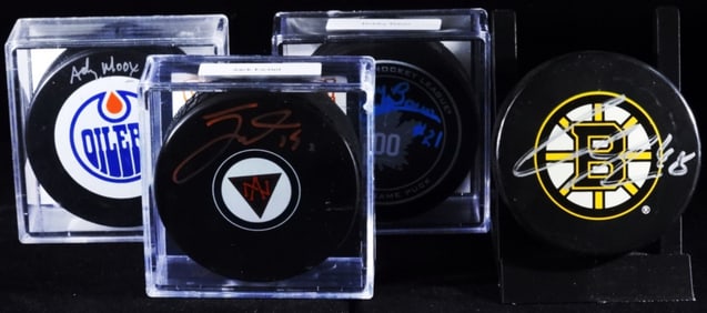 (4) Autographed Hockey Pucks