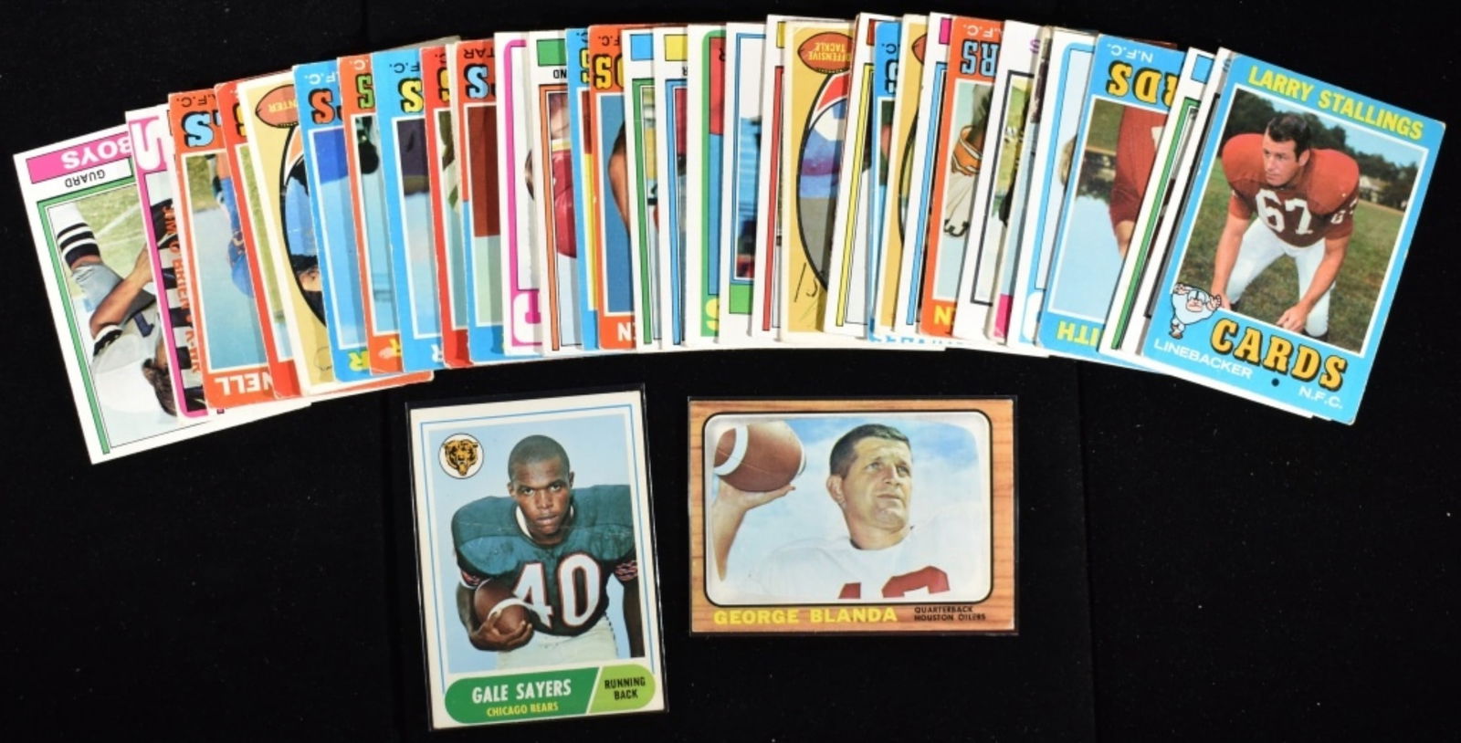 (40) Football Cards Variety Of Years & Teams: George Blanda, Gale Sayers, and Larry Stallins. Conditions may vary. May have duplicates or reprints.