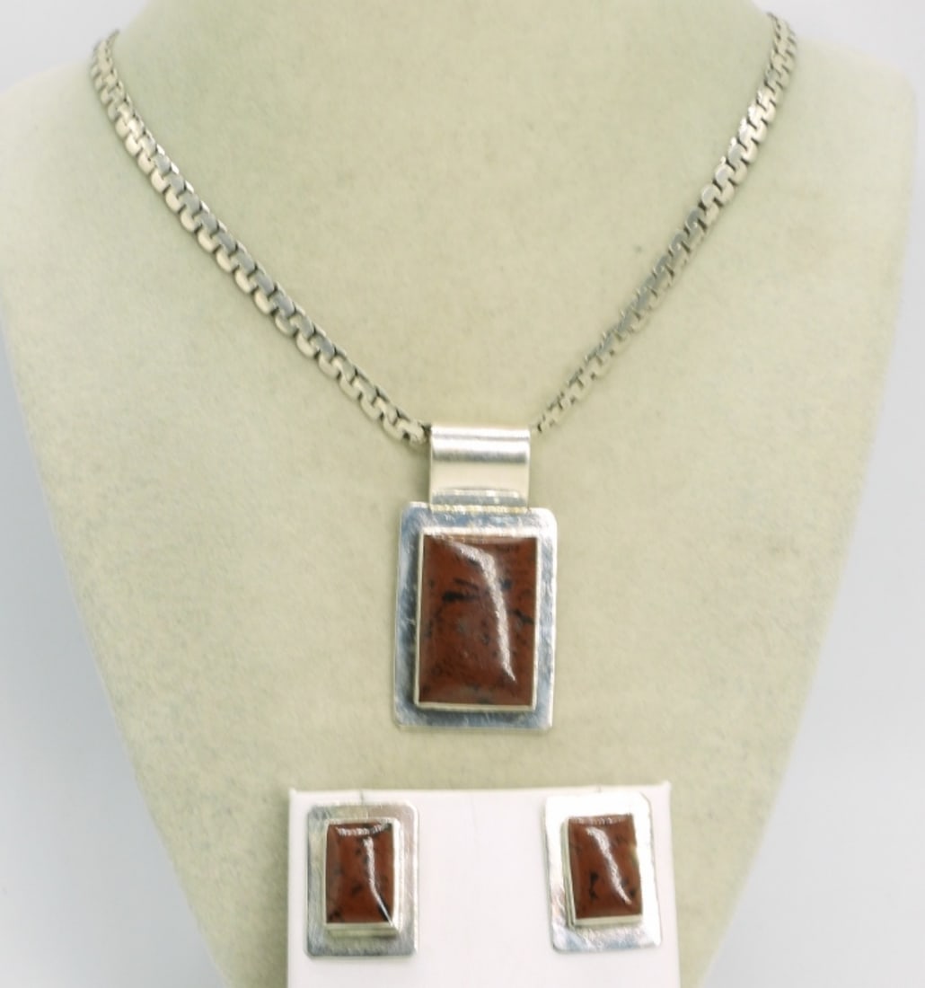 Mahogany Obsidian Sterling Taxco Set: Mahogany Obsidian gemstone, Taxco Mexico Necklace and Pierced Earring Set. Pendant is 2" long. Chain is 20" long. Earrings are pierced and 1" long. All Marked "Mexico TS-94 925". (29 dwt) 
