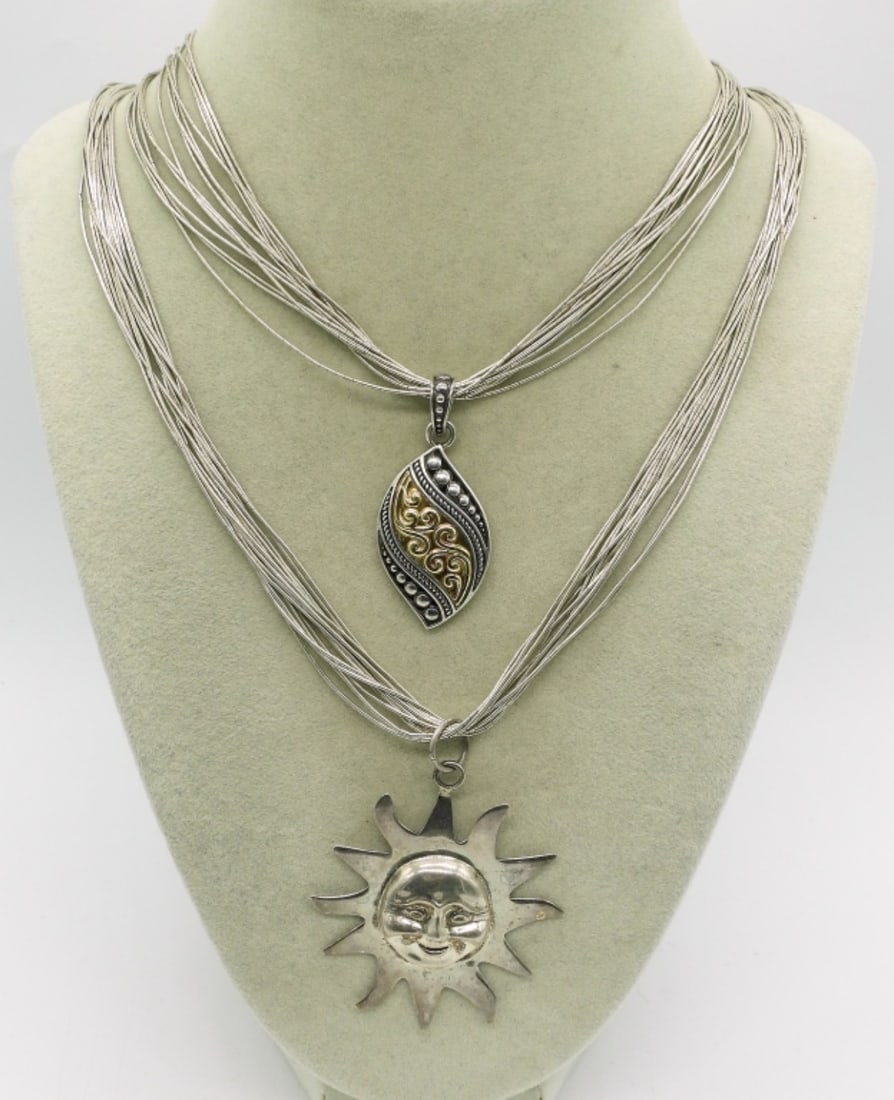 2 Liquid Sterling Necklaces with Pendants: Two liquid sterling necklaces with pendants. 18" & 24". (29.4 dwt) (6x4x2)