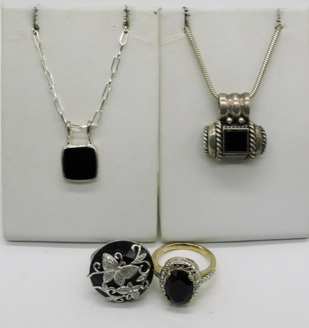 Black Onyx Sterling Rings and Necklaces: Two sterling vintage, black onyx necklaces, 15" long chains. Two sterling rings, sizes 9 & 10. (21 dwt)