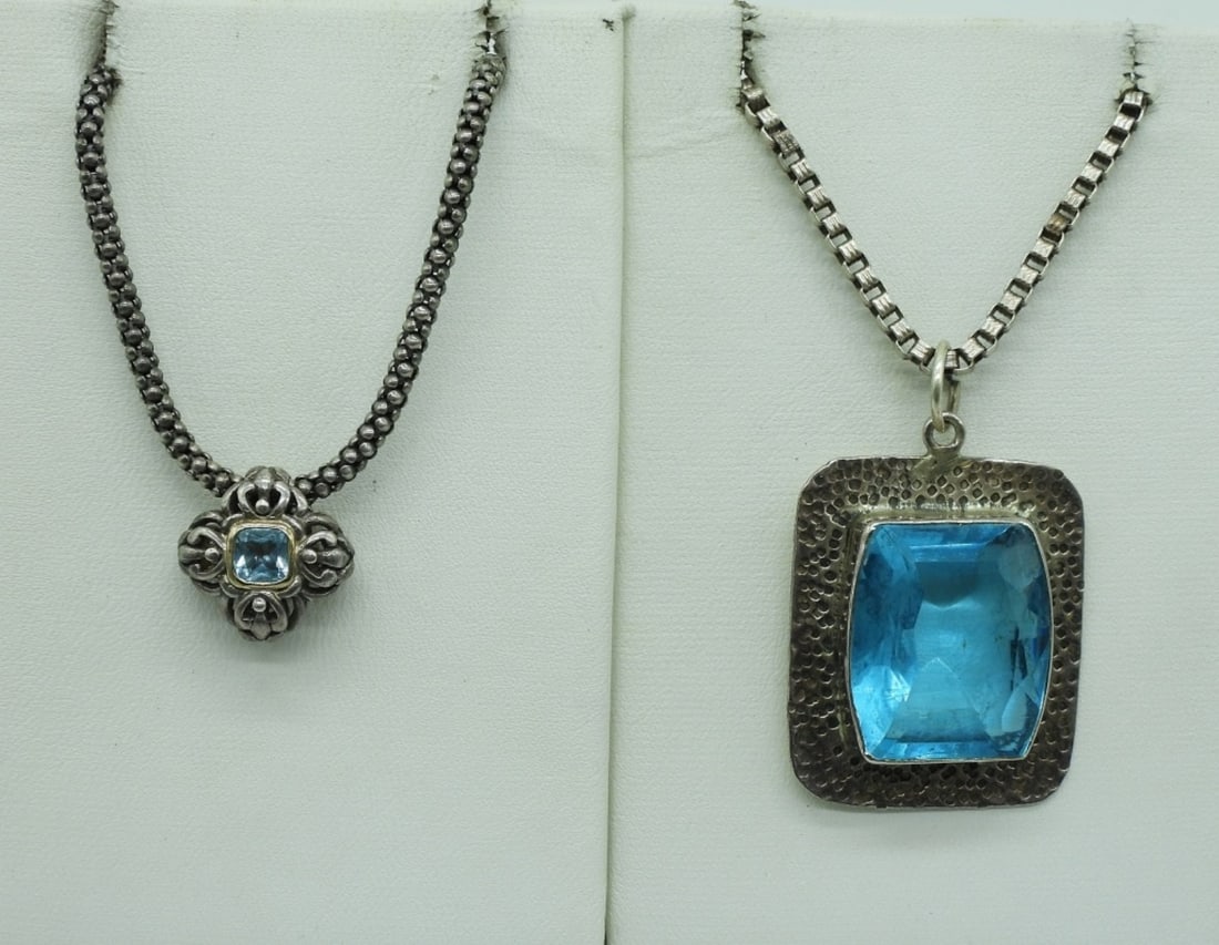 Two Sterling Blue Topaz Necklaces: Two sterling blue topaz necklaces 16-18" long. (18 dwt)