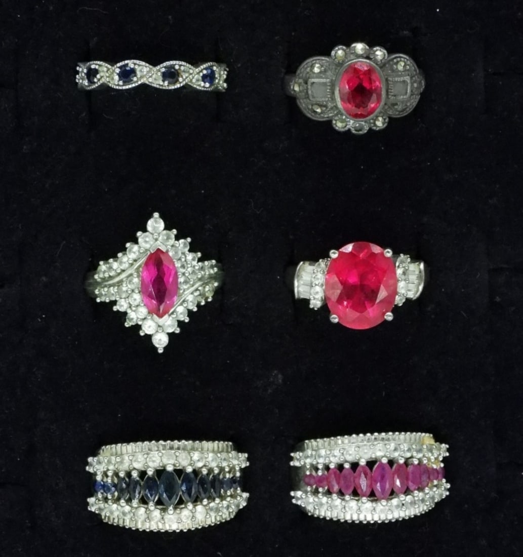 Simulated Ruby & Sapphire Sterling Rings: Six sterling rings with simulated rubies and sapphires. Sizes 5.5-7 (18 dwt) (6x4x2)