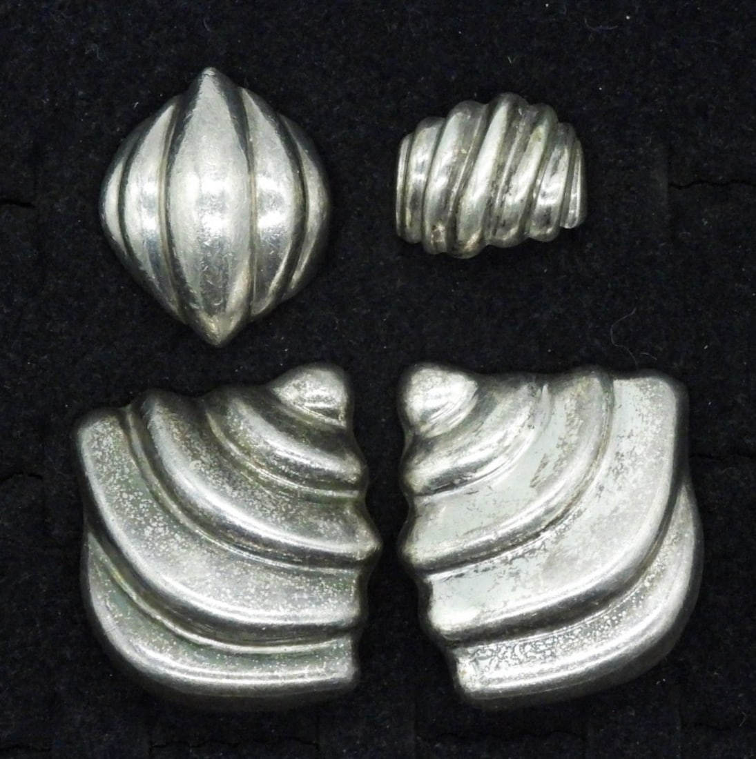 Taxco 925 Clip on Earrings & Rings: One pair of sterling Taxco clip on earrings. Marked "Mexico 925 TR-112", 1.5" long. Vintage sterling rings, size 7-8 (37.2 dwt) (6x4x2)