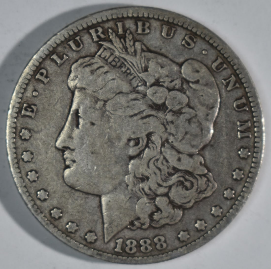 1880-O Morgan Dollar, Hot Lips: Follow us on Facebook, Instagram, X, and TikTok.