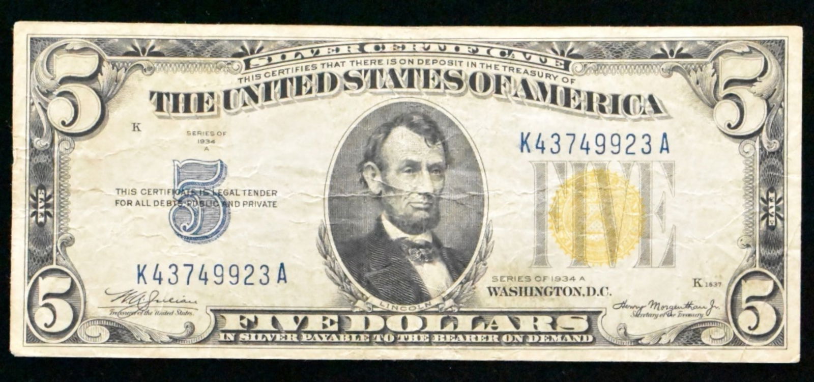 1934 A $5 Silver Cert, SN K43749923A: Follow us on Facebook, Instagram, X, and TikTok.