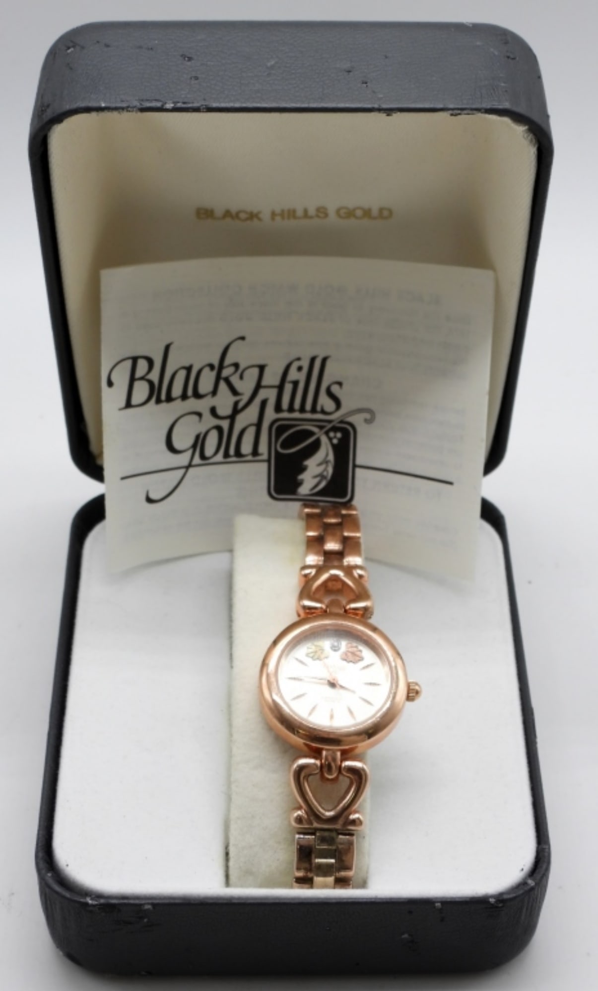 Women's Black Hills Gold Diamond Quartz: Comes in a box, Quartz. The rose gold plate is starting to rub off. Watches are not verified, authenticated, or tested in running condition unless specified.