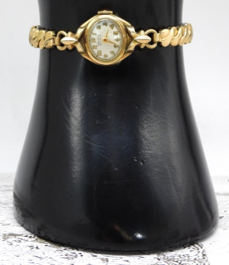 Gruen Veri Thin 10KRGP Women's Watch: Simple yet stylish. With a stretch band. Watches are not verified, authenticated, or tested in running condition unless specified.