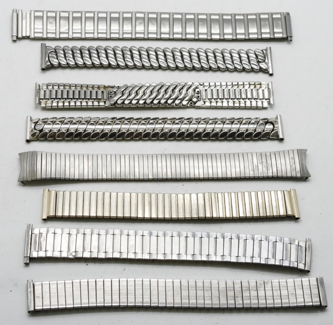 (8) Silver-Tone Stretchy Watch Bands: Stretchy silver-tone watch bands
