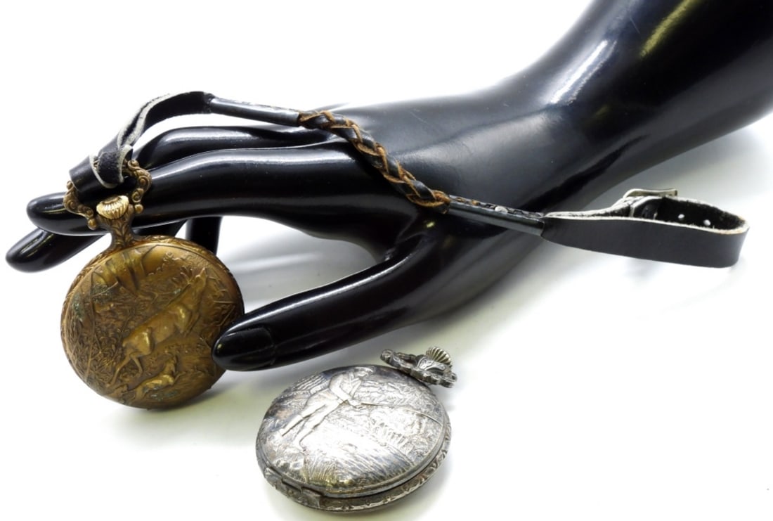 (2) Belle Luisse Pocket Watches: Glass pops off the one with the hunter. Both have a hunting theme on the front. Watches are not verified, authenticated, or tested in running condition unless specified.