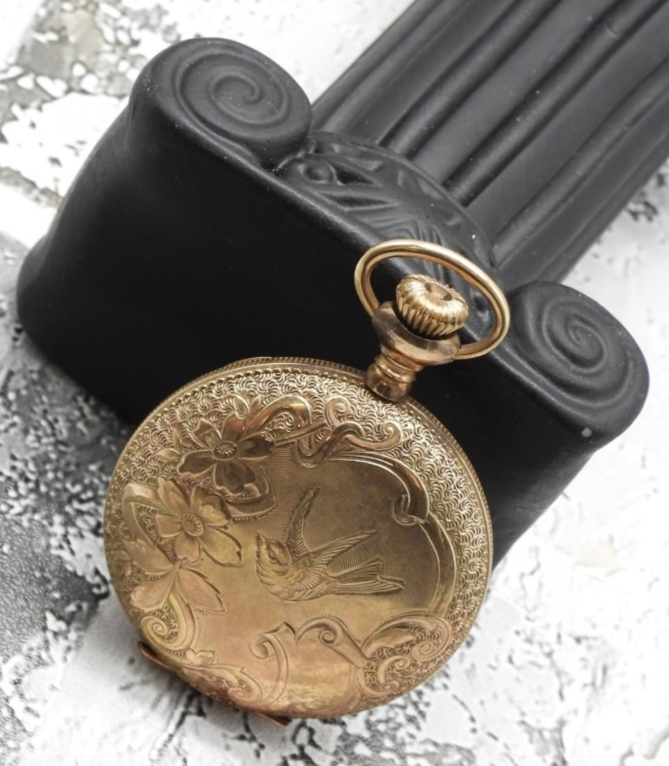 Ladies Hurbert Small Pocket Watch: Decorated with Gypsy Sparrows and flowers. The glass is broken, but the watch does work. Watches are not verified, authenticated, or tested in running condition unless specified.