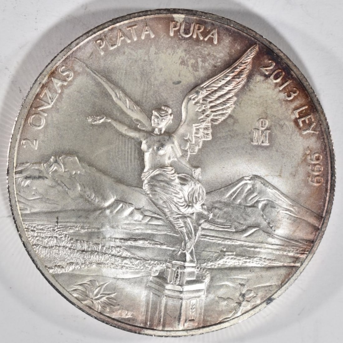 2013 Mo 2 onzas, .999 Silver Round: Follow us on Facebook, Instagram, X, and TikTok.