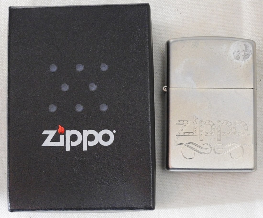 2012 Metallic Background Zippo, Sealed (1 of 3)