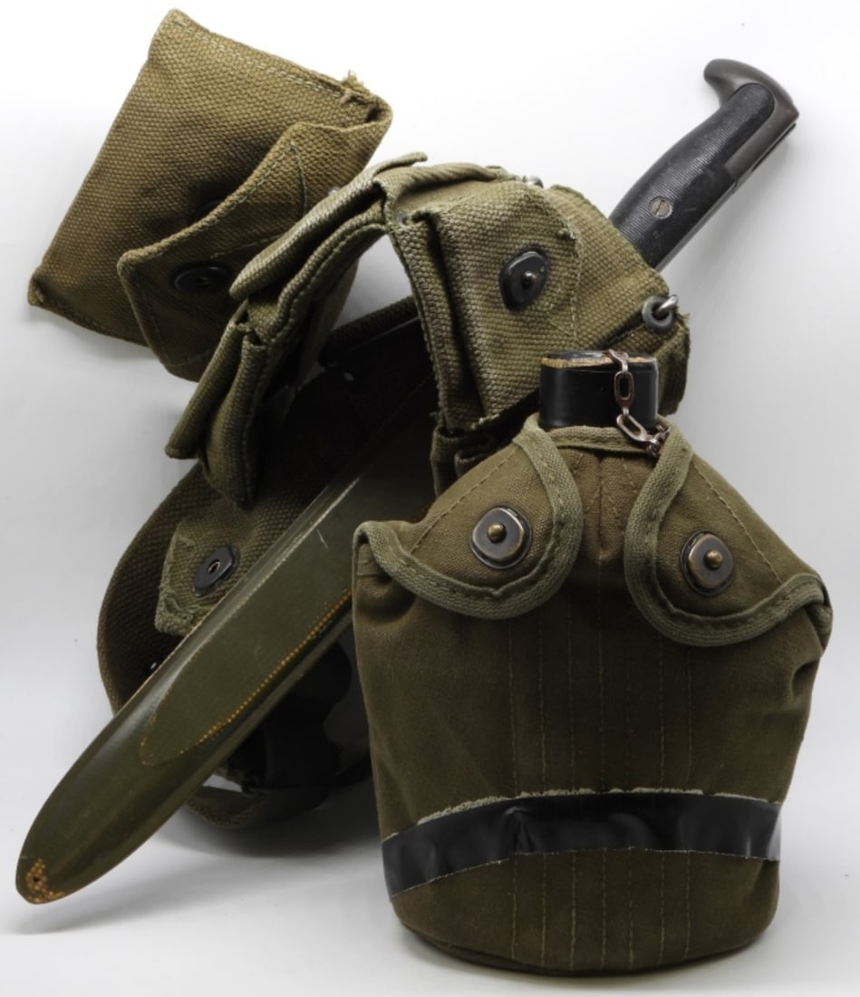 Military Field Gear: Belt, canteen, first aid kit, and bayonet (it has been taped together, so there maybe some tape goo on it.)