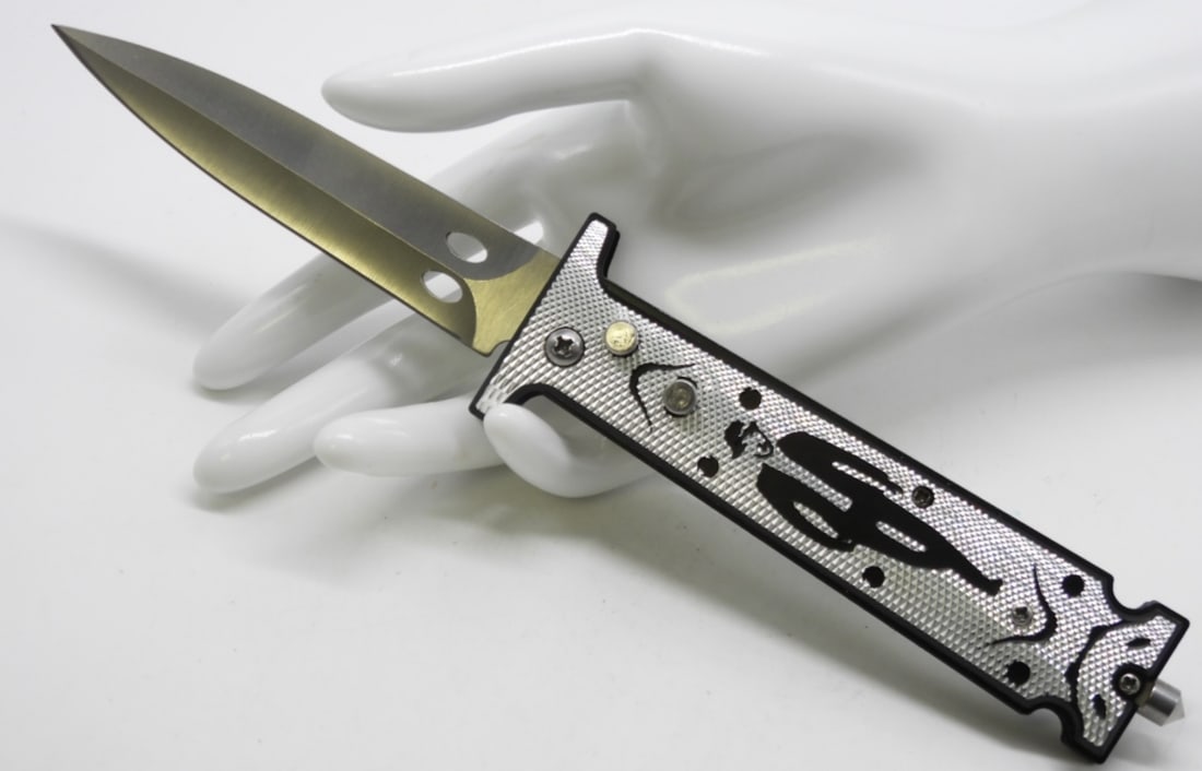 Stylish Spring-Loaded Knife: It has a window brake and a decorative handle