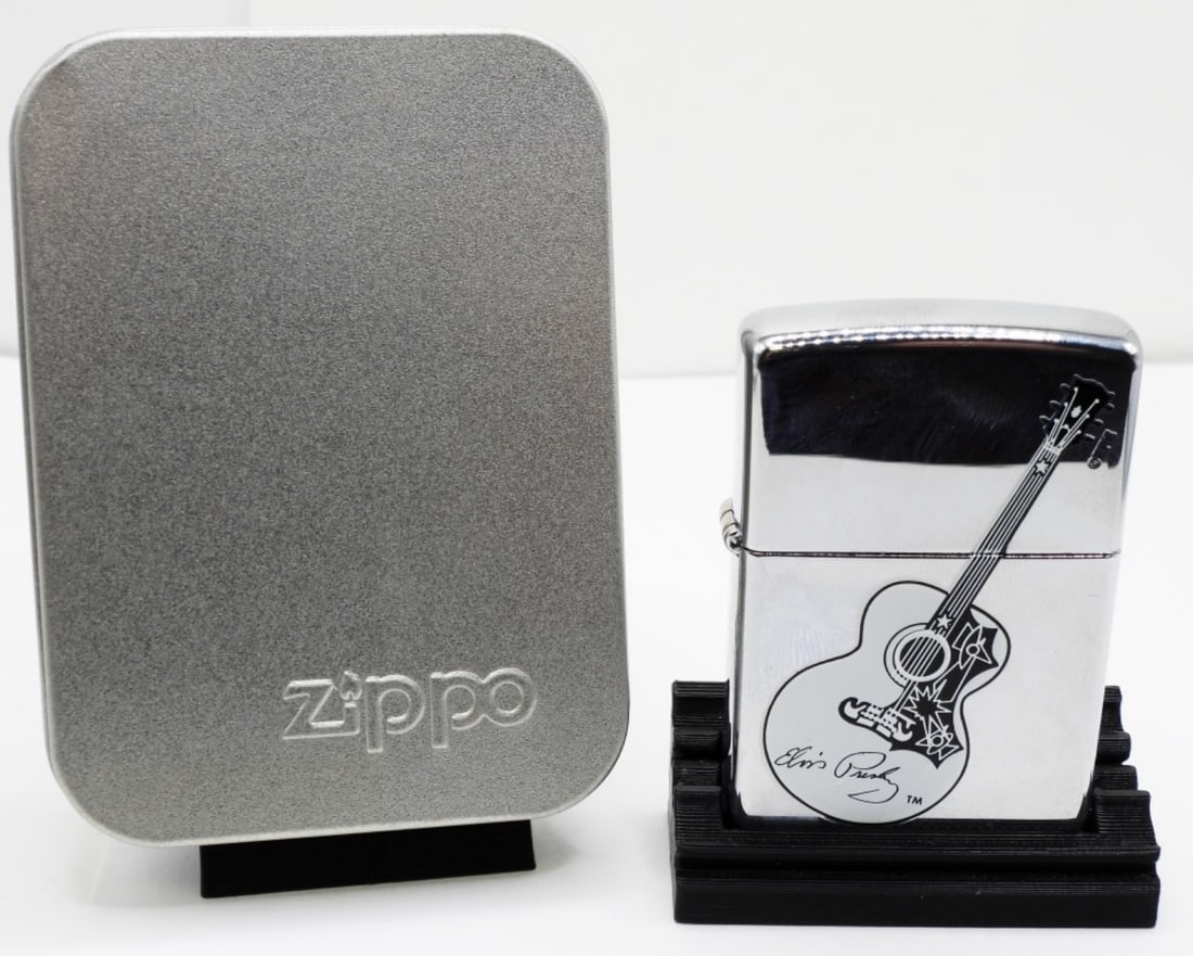 2005 Elvis Presley Guitar Zippo Sealed: Sealed. Comes in a tin box. 2005