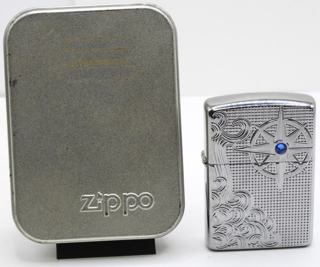 2017 Zippo Armor Luxury Waves Crystal Sealed: Sealed and comes in a box. Has a blue stone in the middle of the star.
