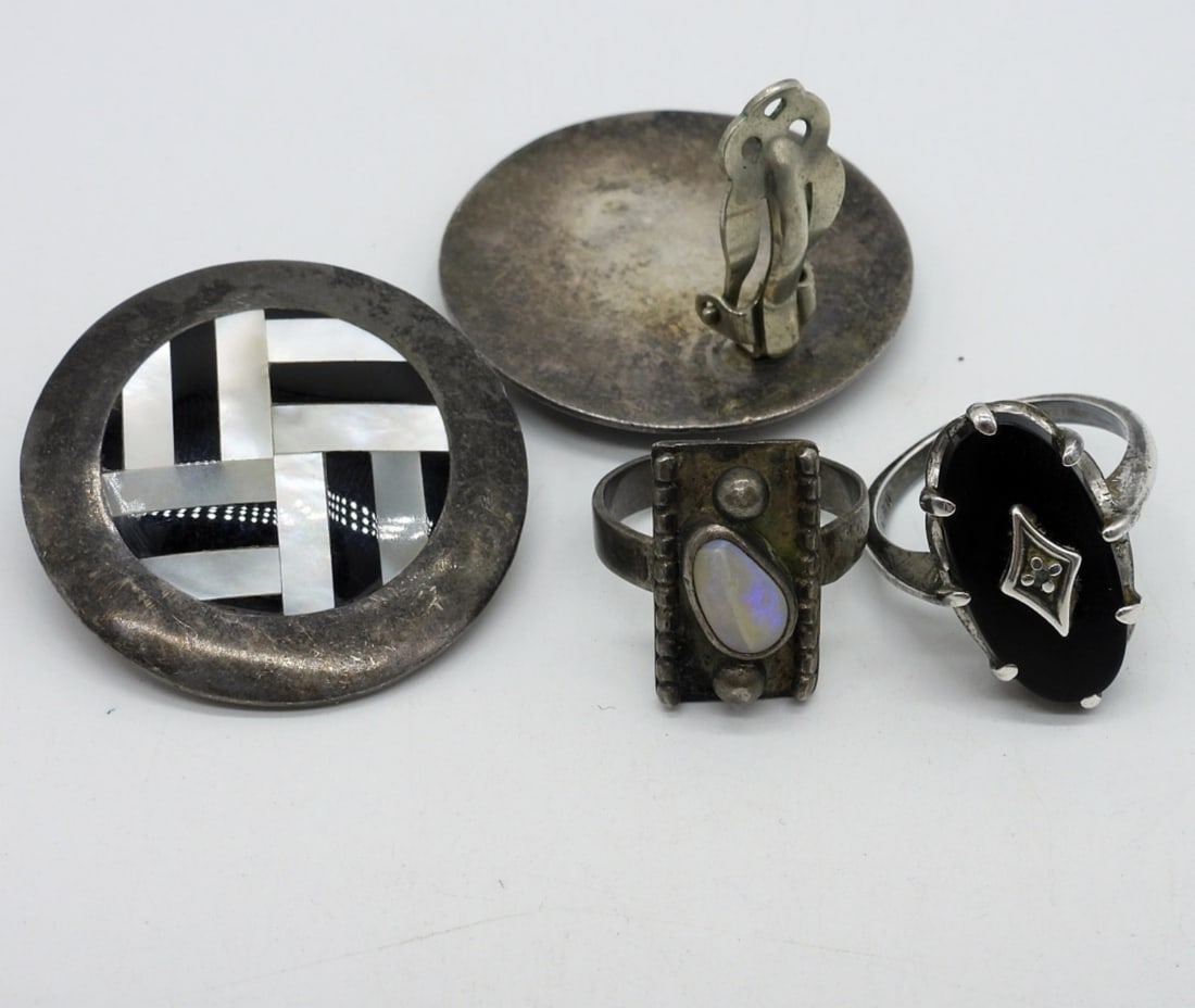 Sterling Mother of Pearl, Onyx & Opal Pieces: Vintage sterling clip on earrings with inlaid mother of pearl and black onyx. Two rings, one opal and one with black onyx. Ring sizes 5.5 & 6.5 (15.8 dwt)