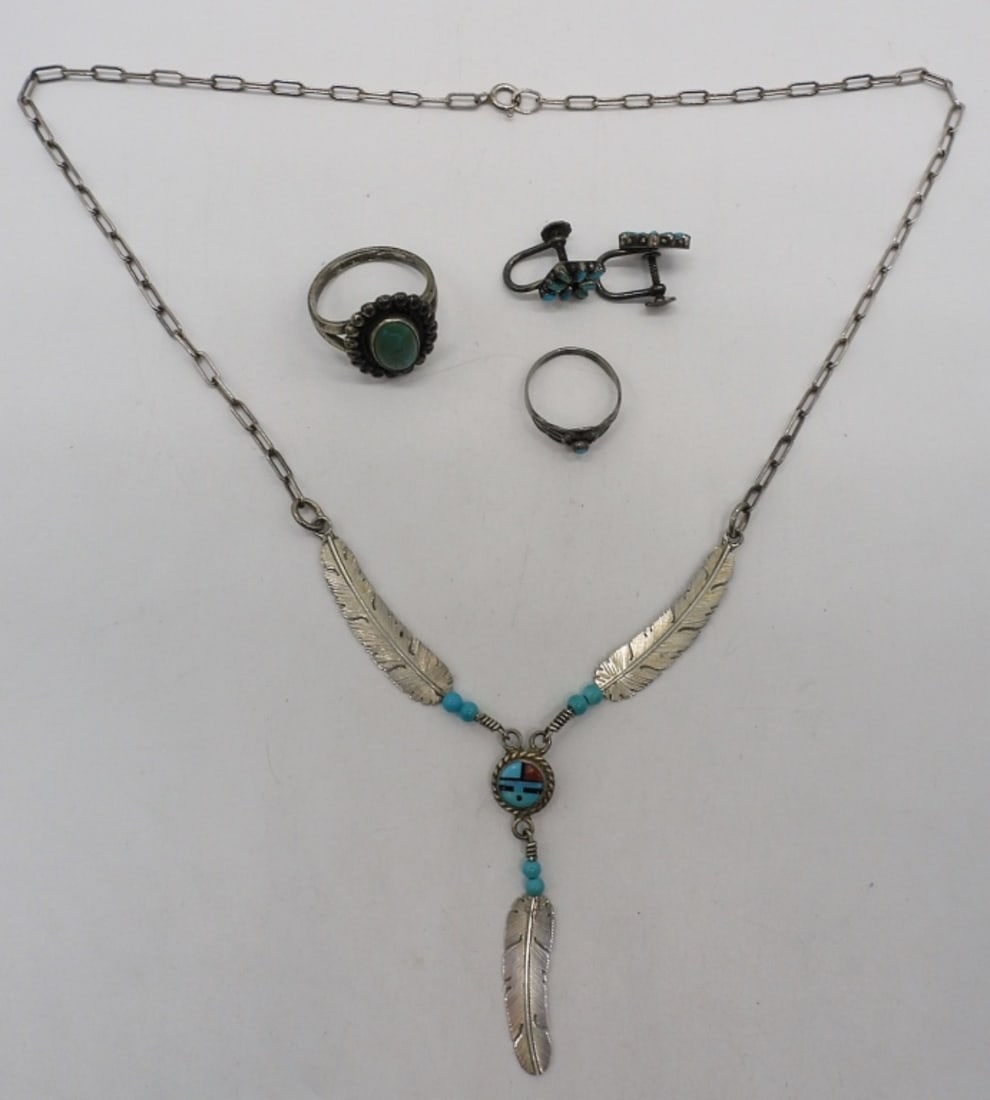 Southwest Style Turquoise 925 Rings & More: Two sterling rings with turquoise gemstones, size 3.5 & 7. Screw back turquoise earrings. Necklace is 20" long. (10 dwt)