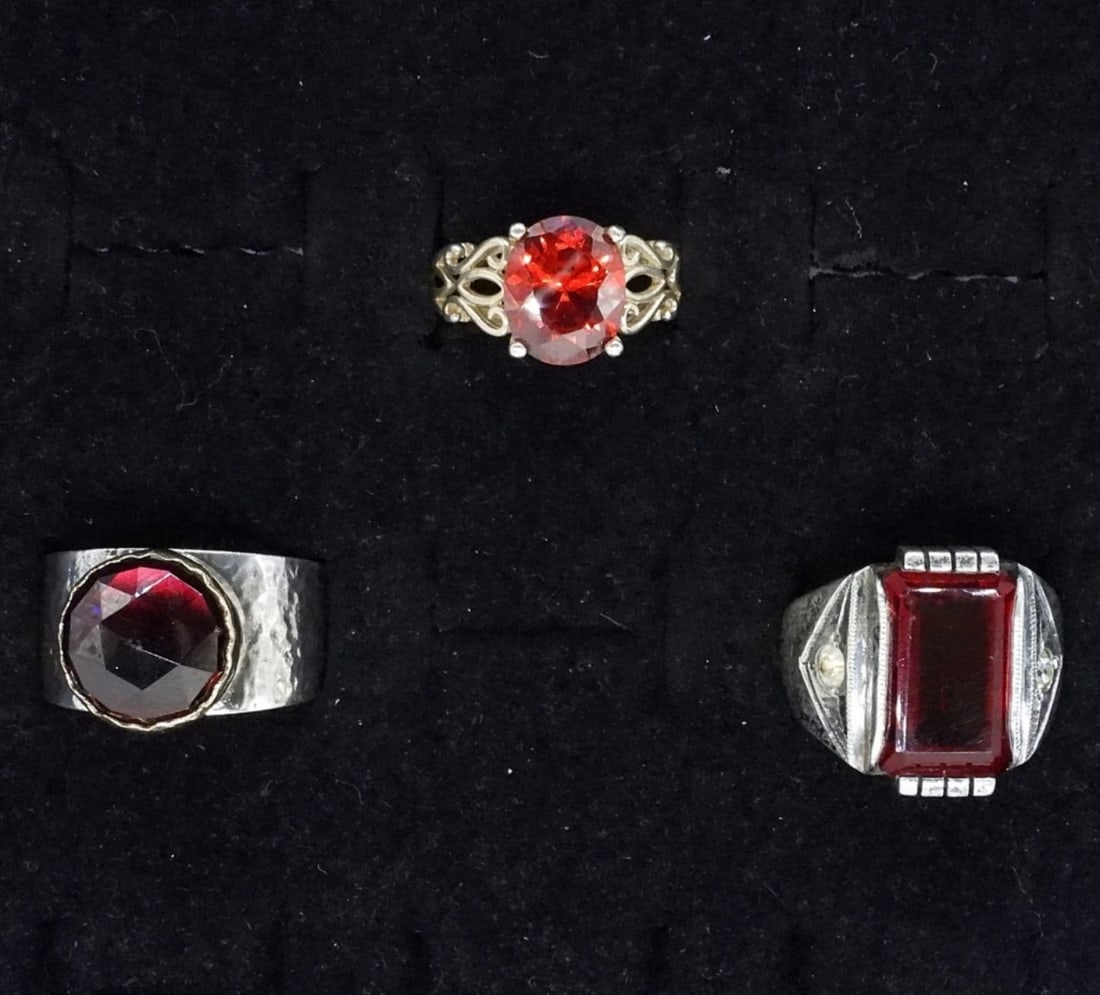 3 Simulated Ruby Sterling Rings: Three simulated ruby sterling rings, sizes 6 & 10. (15 dwt)