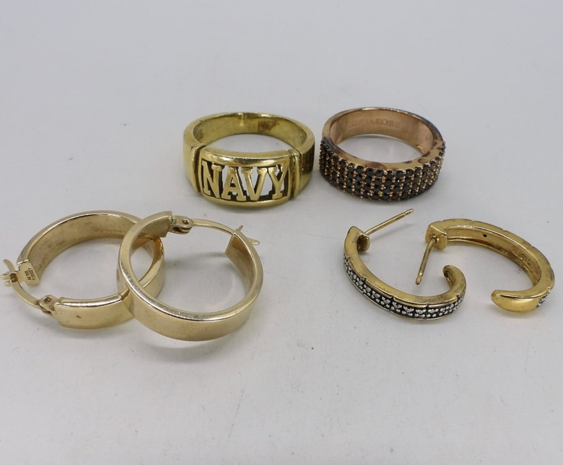 Sif Jakobs & Navy Gold Tone 925 Rings: Gold toned sterling. Navy ring, size 10. Sif Jakobs brand, black gemstone ring, size 8. Two pair of sterling, gold toned pierced earrings. (11.2 dwt)