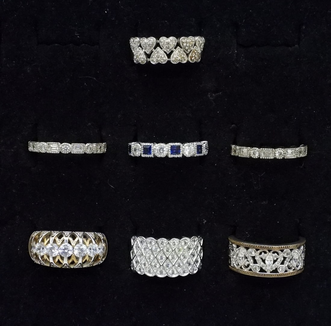 7 Sterling Bridal Band Style Rings: Seven sterling rings with simulated diamonds. Sizes 8 & 9. (19 dwt)