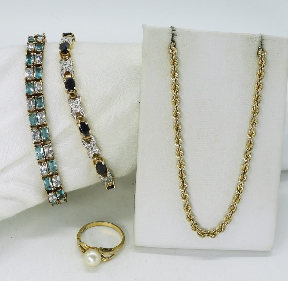 Gold Tone 925 Gemstone Bracelets & More: Two sterling gold tone bracelets with pretty blue gemstones, 7.5 - 8" long. Gold tone sterling chain, 24". Pearl gold tone 925 ring, size 7. (37.2 dwt)