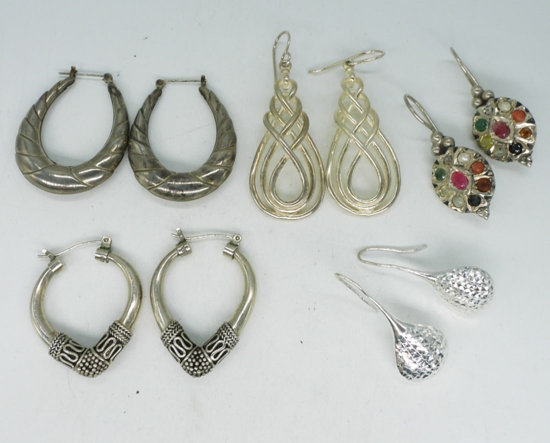 5 Pair Sterling Pierced Earrings: Five pair of sterling silver pierced earrings. 1.5" - 2" long. (24 dwt)
