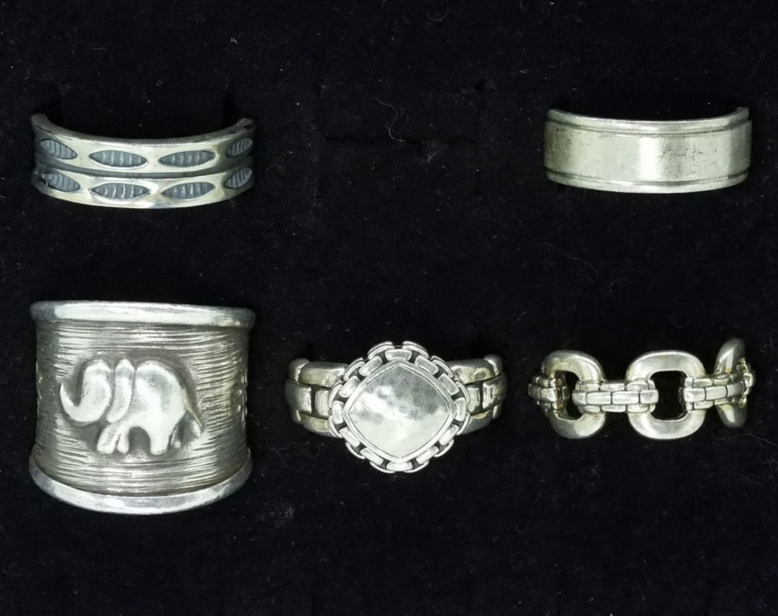 Five Sterling Fashion Rings: Five sterling fashion rings. Sizes 10, 11, 12. (32.8 dwt)