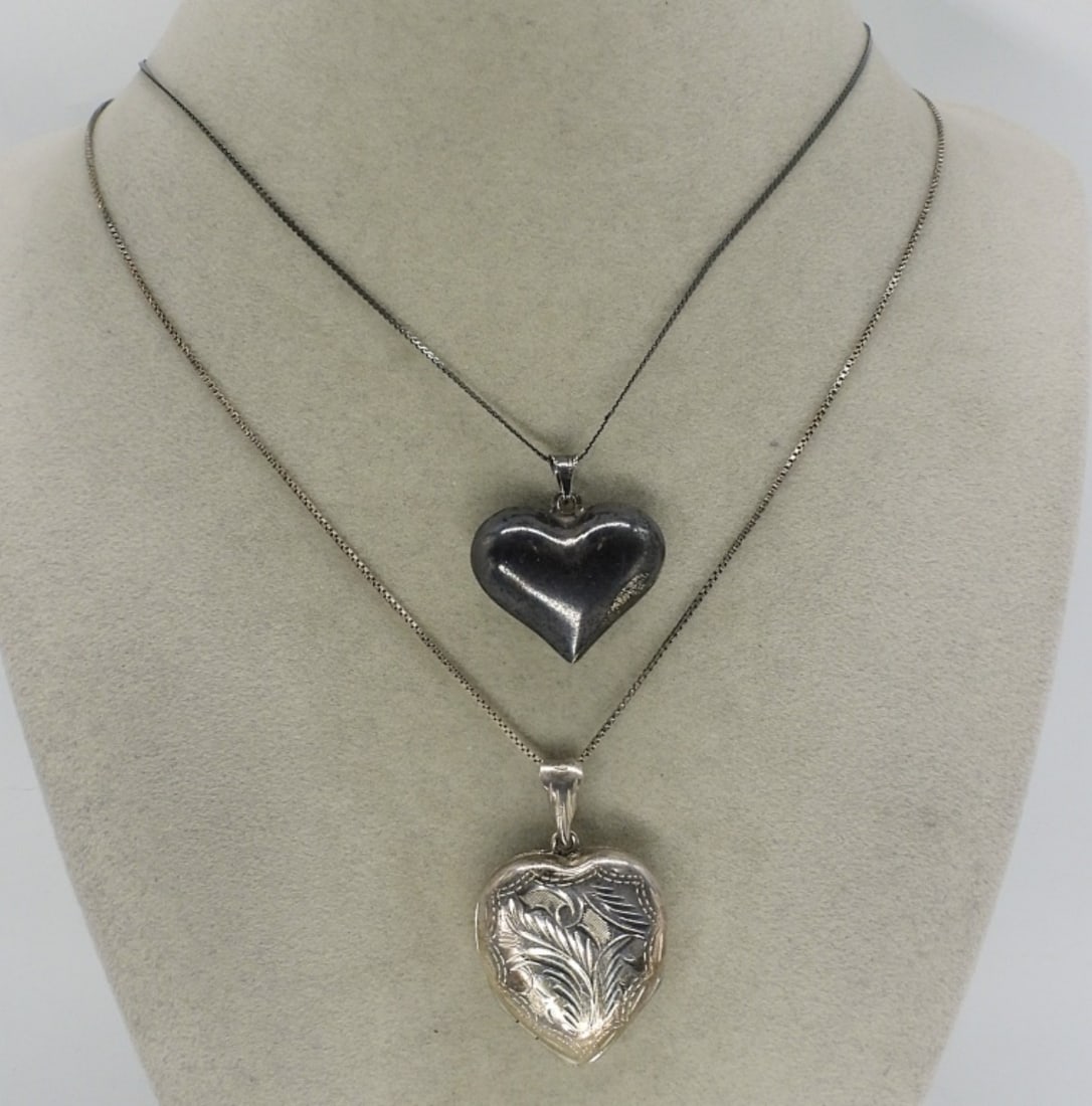2 Vintage 925 Heart Necklaces - Locket: Two sterling heart necklaces, 20" & 22" chains. One is a locket, see photos. (12.4 dwt)